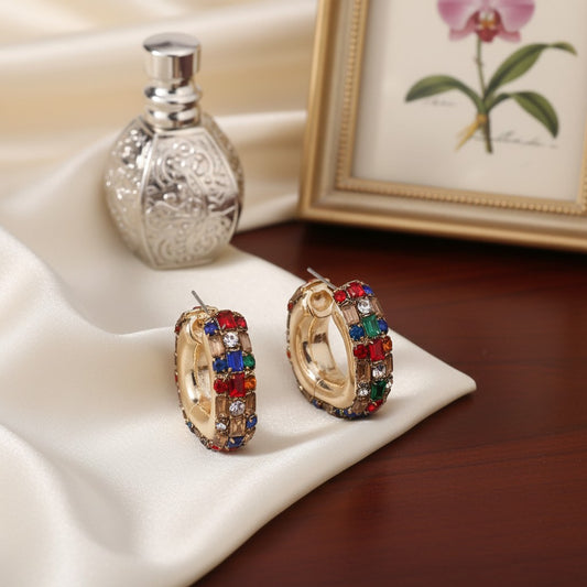 House of eLLe Mini Life Of The Party hoop earrings featuring colorful baguette crystals set in gold-tone metal.