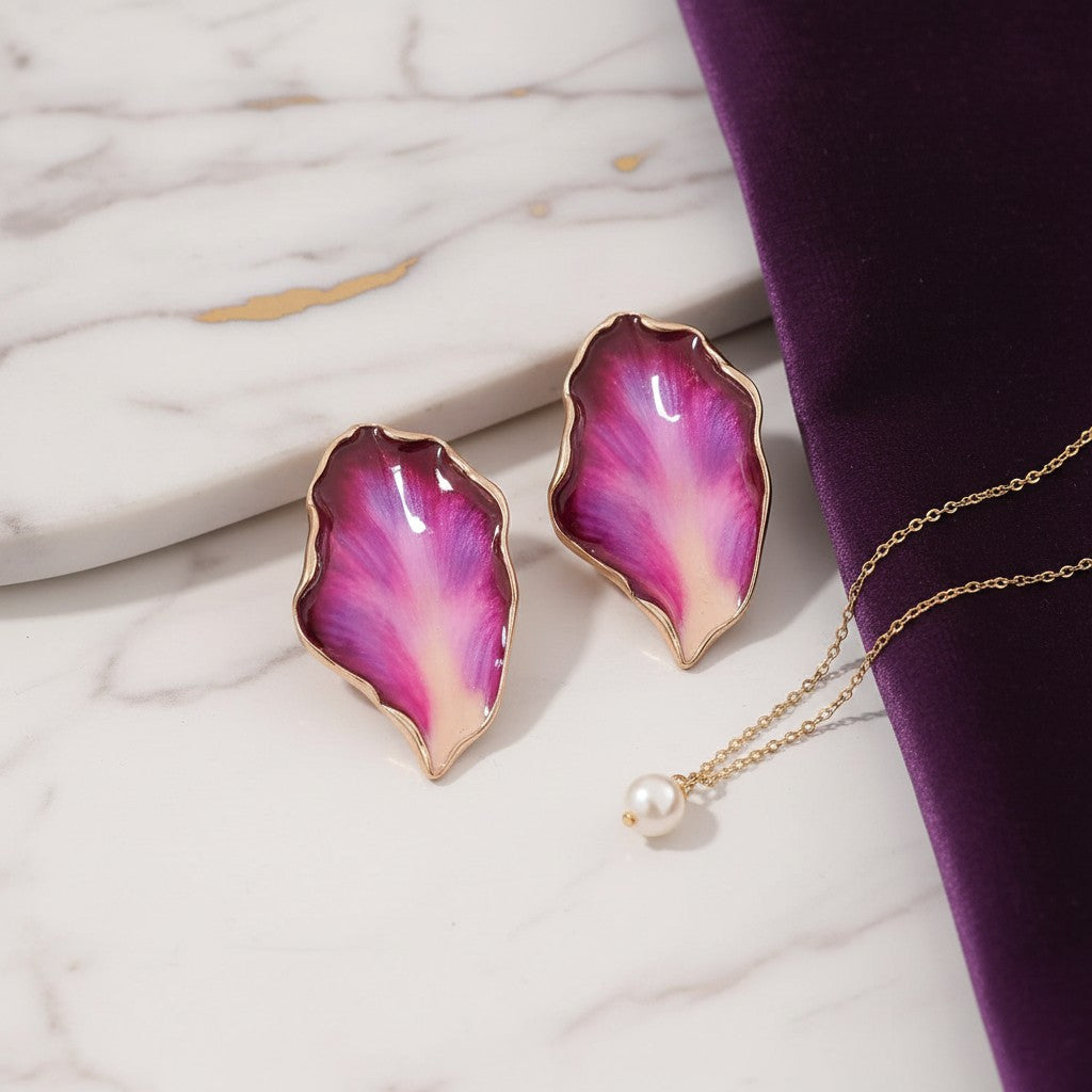 House of eLLe Beautiful Me earrings featuring organic petal-shaped designs in gradient rose red and cream enamel.