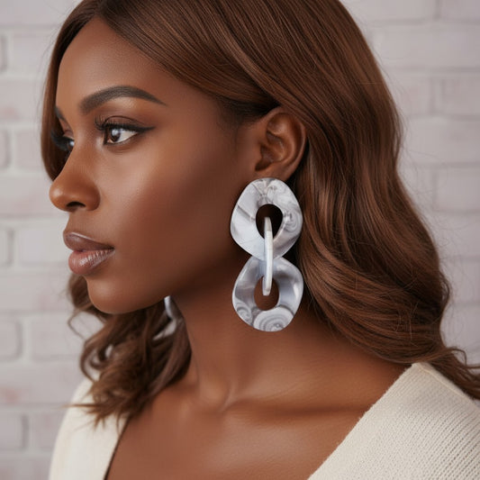 House of eLLe Never A Dull Moment earrings in gray marbled acrylic with a unique geometric dangle design.