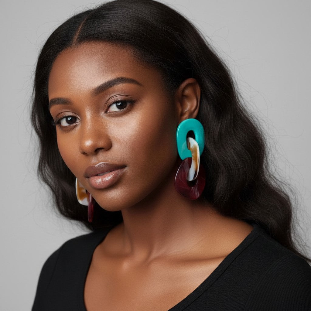 House of eLLe multi-colored acrylic link drop earrings in teal and burgundy.