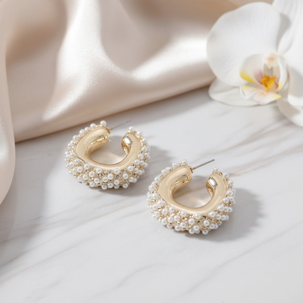 House of eLLe Mini Life Of The Party hoop earrings featuring gold-tone metal accented with small white pearls.