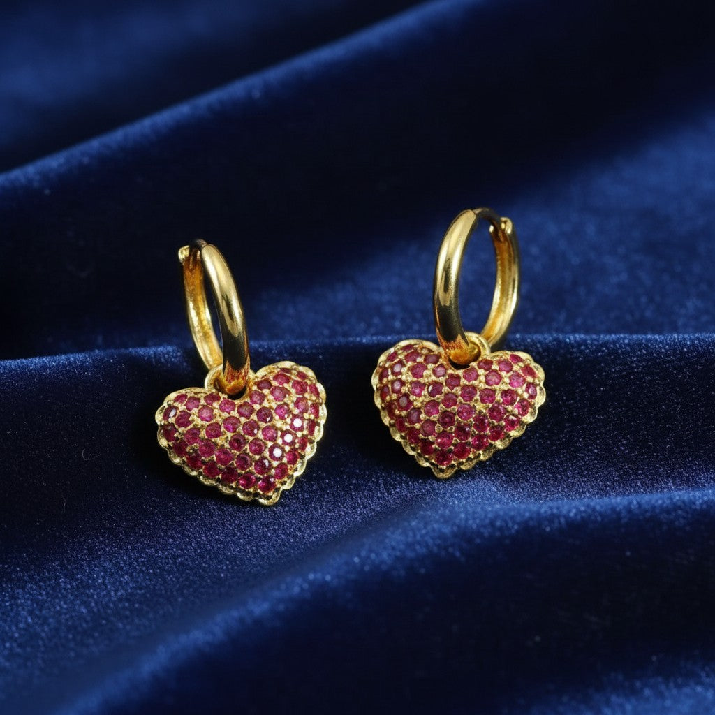House of eLLe Mini Love Bling hoop earrings featuring pink crystal-encrusted heart charms in 18K gold plated finish.
