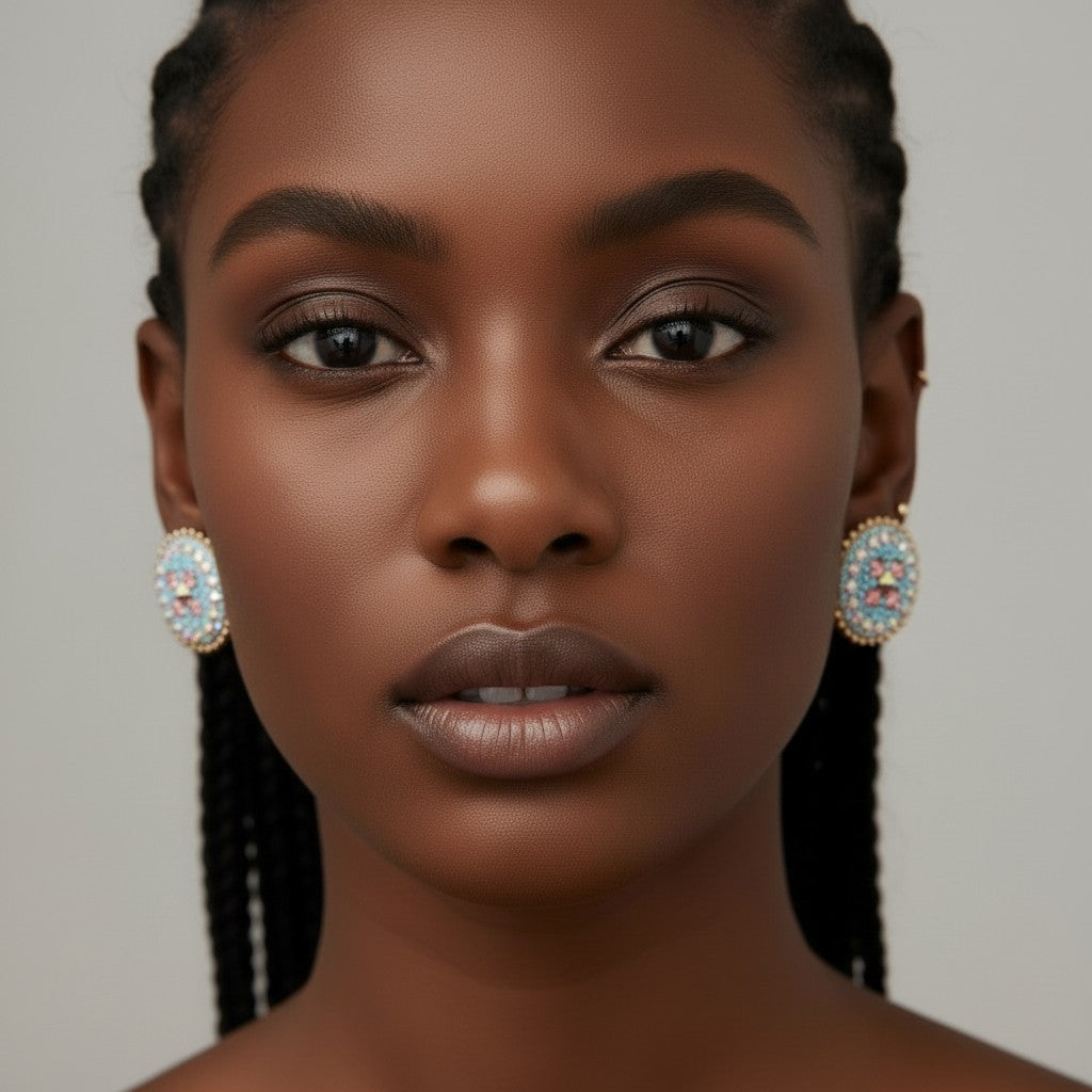 House of eLLe round beaded earrings with blue, pink, and clear crystals in a floral pattern.