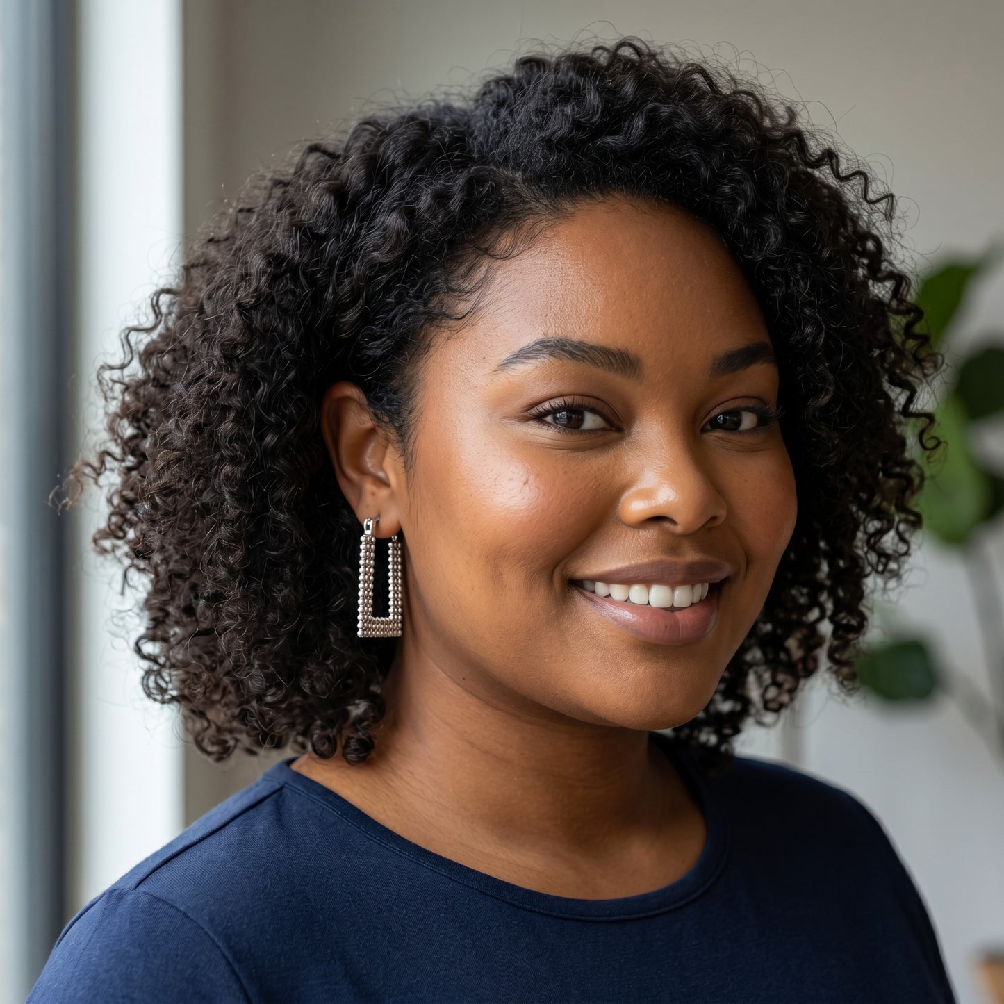 Woman wearing House of eLLe Always A Vibe silver rectangular beaded hoop earrings