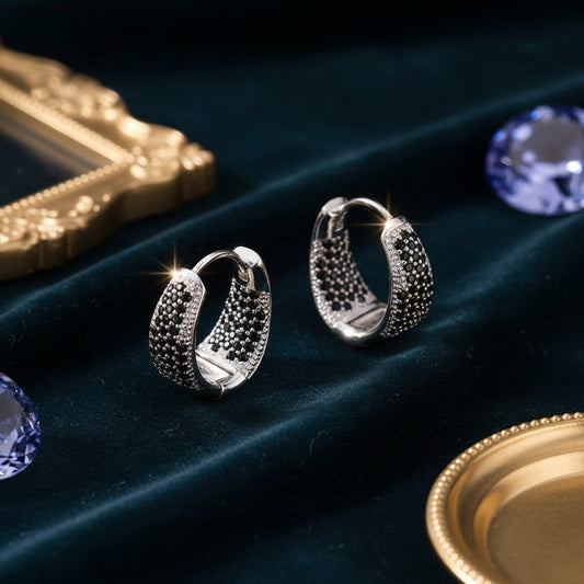 House of eLLe Dipped In Bling silver hoop earrings featuring sparkling black diamond pavé stones on velvet.